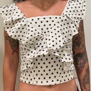 Super cute polka dot ruffle top in good condition